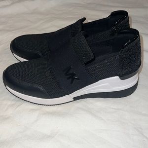 Michael Kors Sneakers Size:8 Black and White with mesh and glitter.